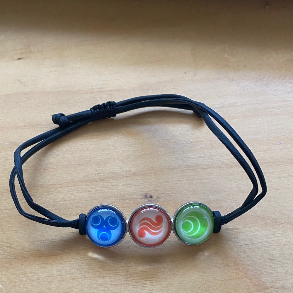 Black Cord Bracelet with Blue, Red, and Green Symbols